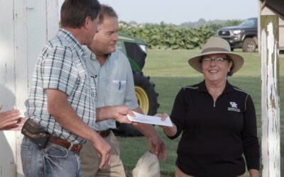 KyCorn Presents Check for UK Grain and Forage Center of Excellence at Field Day